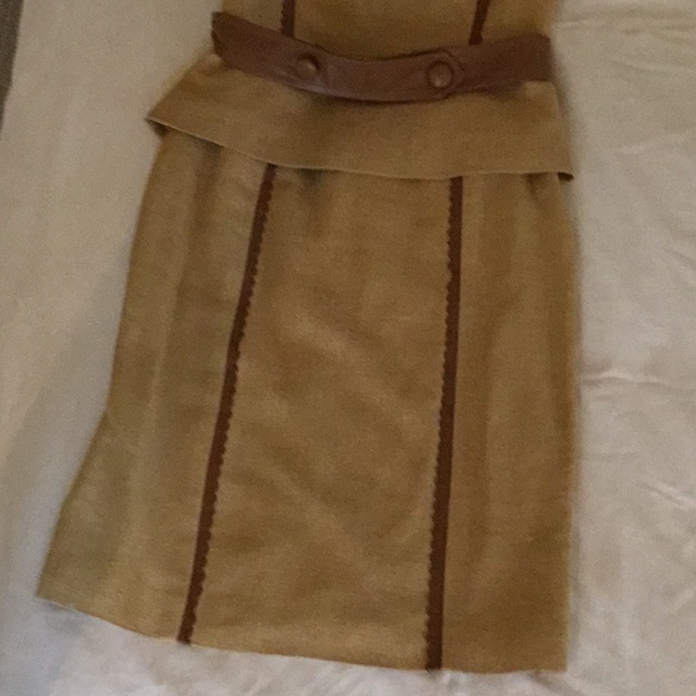 Silk skirt and top with leather trim.